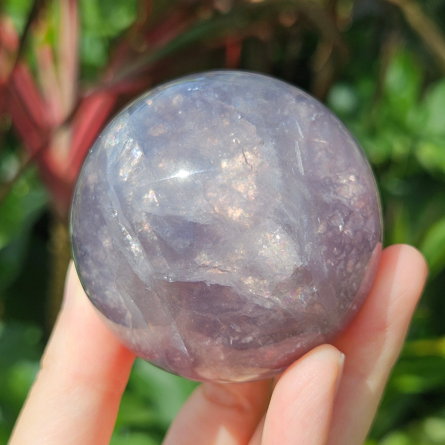 Mica in purple fluorite sphere