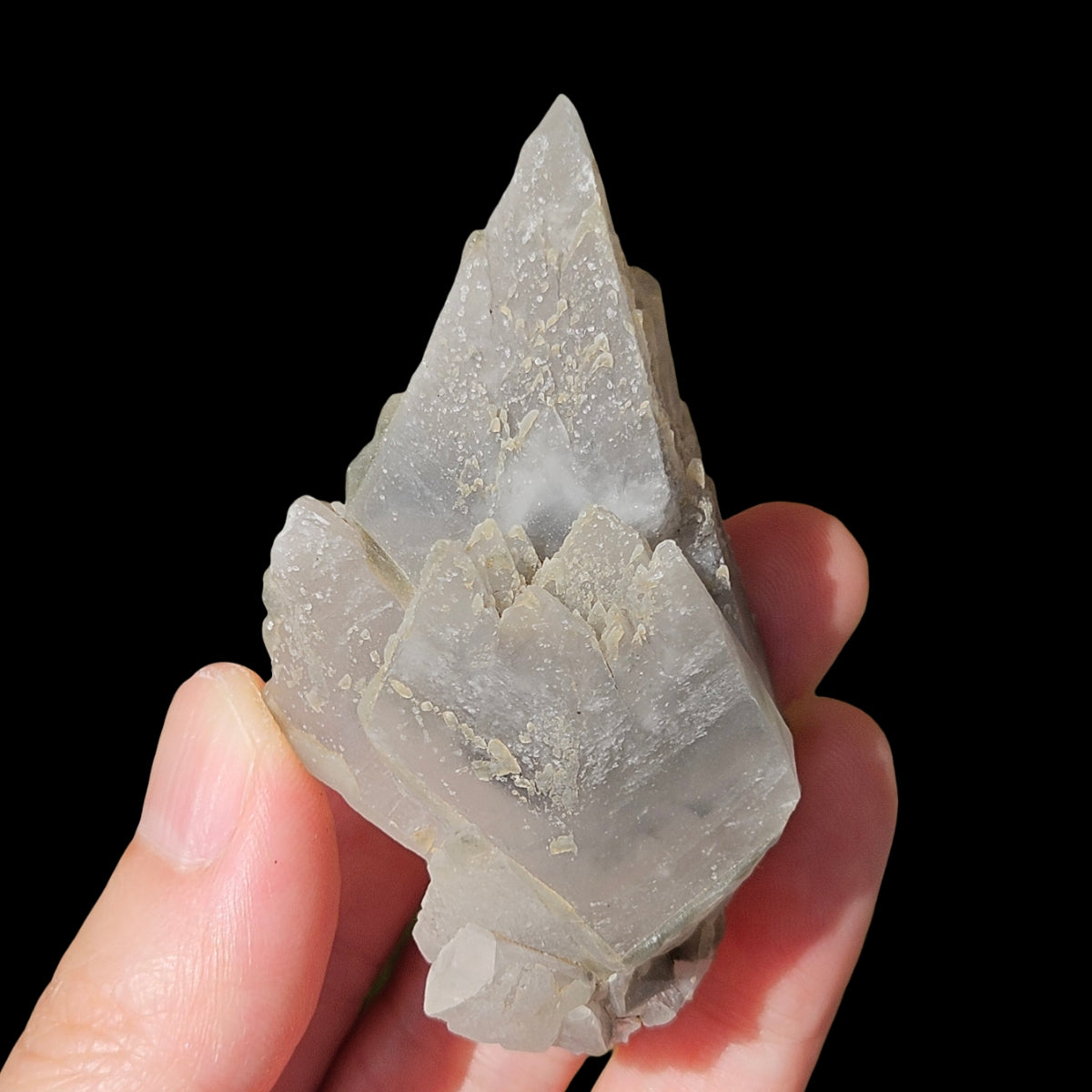 Grey stellar beam calcite
