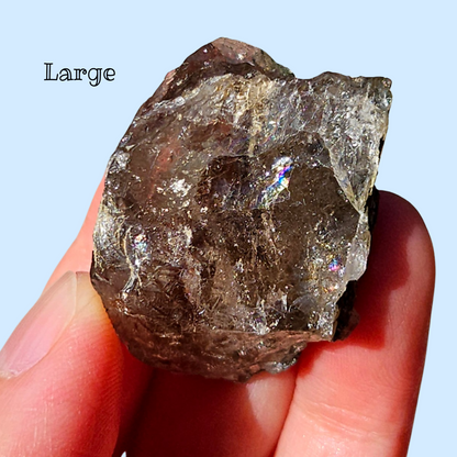 Phenacite on smoky quartz