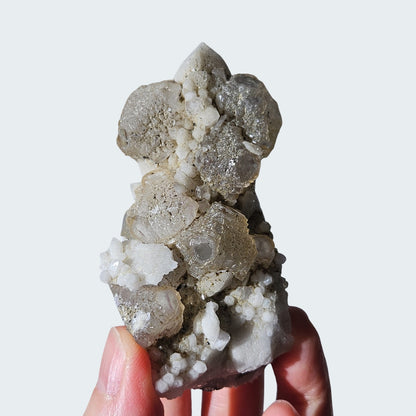 Stepped fluorite over white quartz point from Inner Mongolia