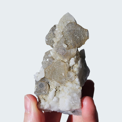 Stepped Fluorite on Quartz