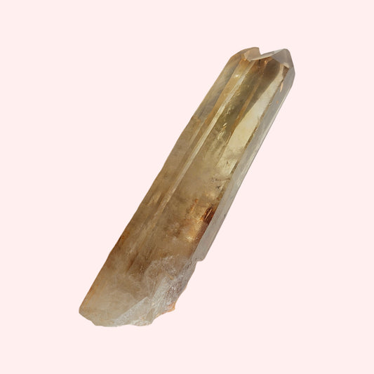 A smoky double-pointed citrine wand with a natural, unpolished surface.