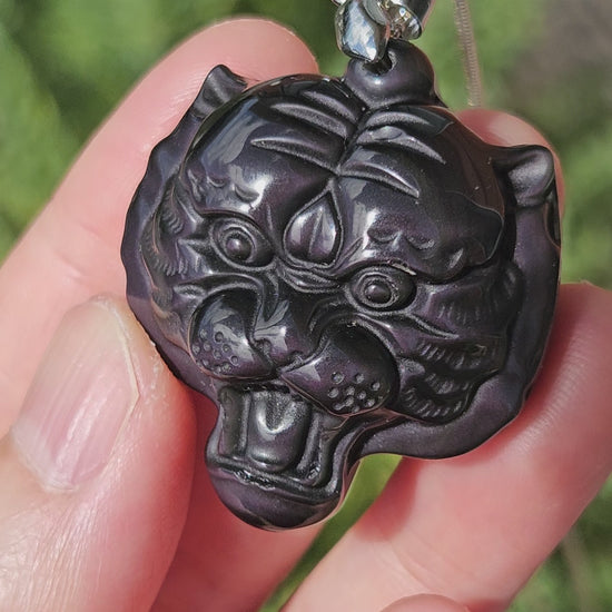 Video of rainbow obsidian tiger pendant