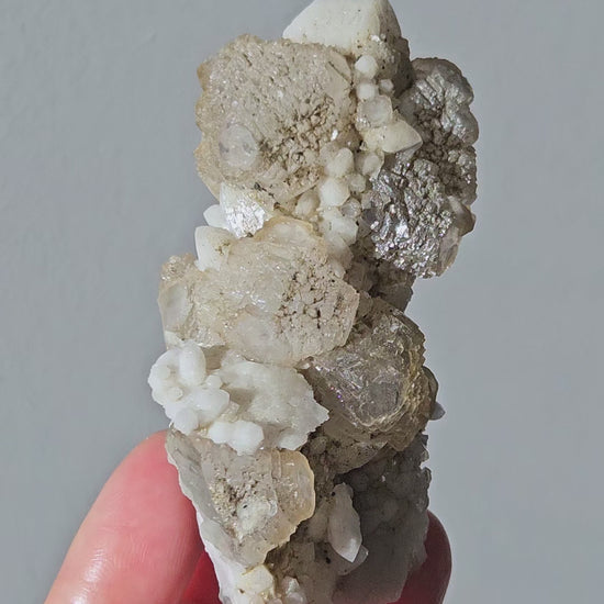 Video of stepped fluorite on white quartz from Inner Mongolia
