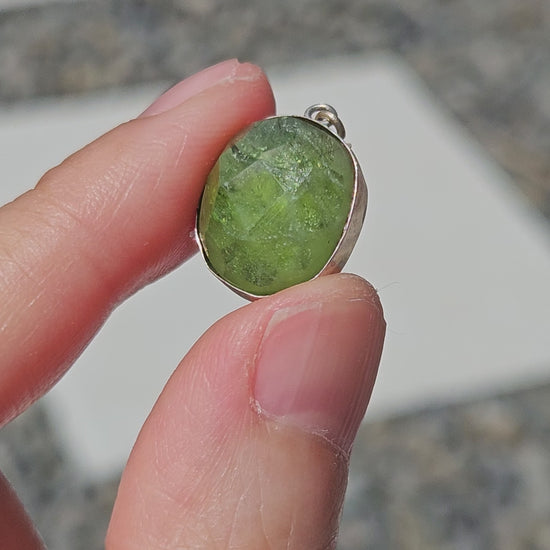 video of peridot pendant
