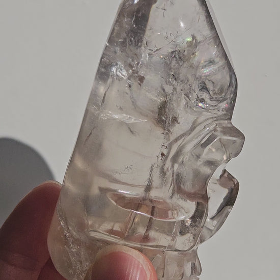 Video of smoky quartz crystal skull with rainbow reflections