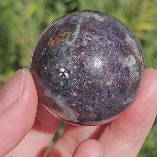 Video of iolite sunstone sphere