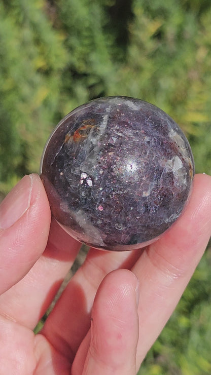 Video of iolite sunstone sphere