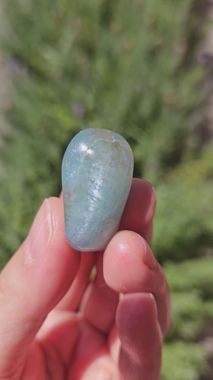 Video of Aquamarine tumble with chatoyant sheen